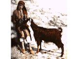 A Beduin shepherd boy with a goat. An early photograph.